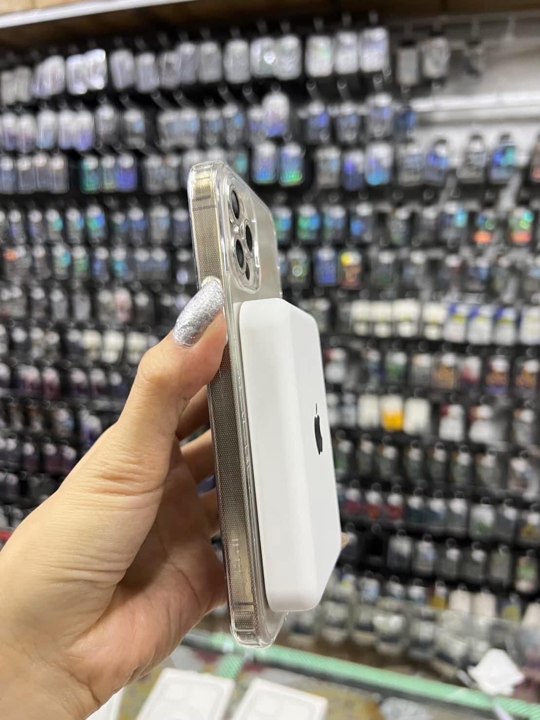ພາເວີແບັງໄຮ້ສາຍ Power Bank 10000mAh ຫຍີ້ຫໍ້ iPhone ສາກໄຟເຂົ້າສະຖຽນ, ຮັກສາແບັດໄດ້ດີ, ສາກແບັດເຕັມໄວ ແລະ ອຸປະກອນປອດໄພໃນການໃຊ້ງານ.