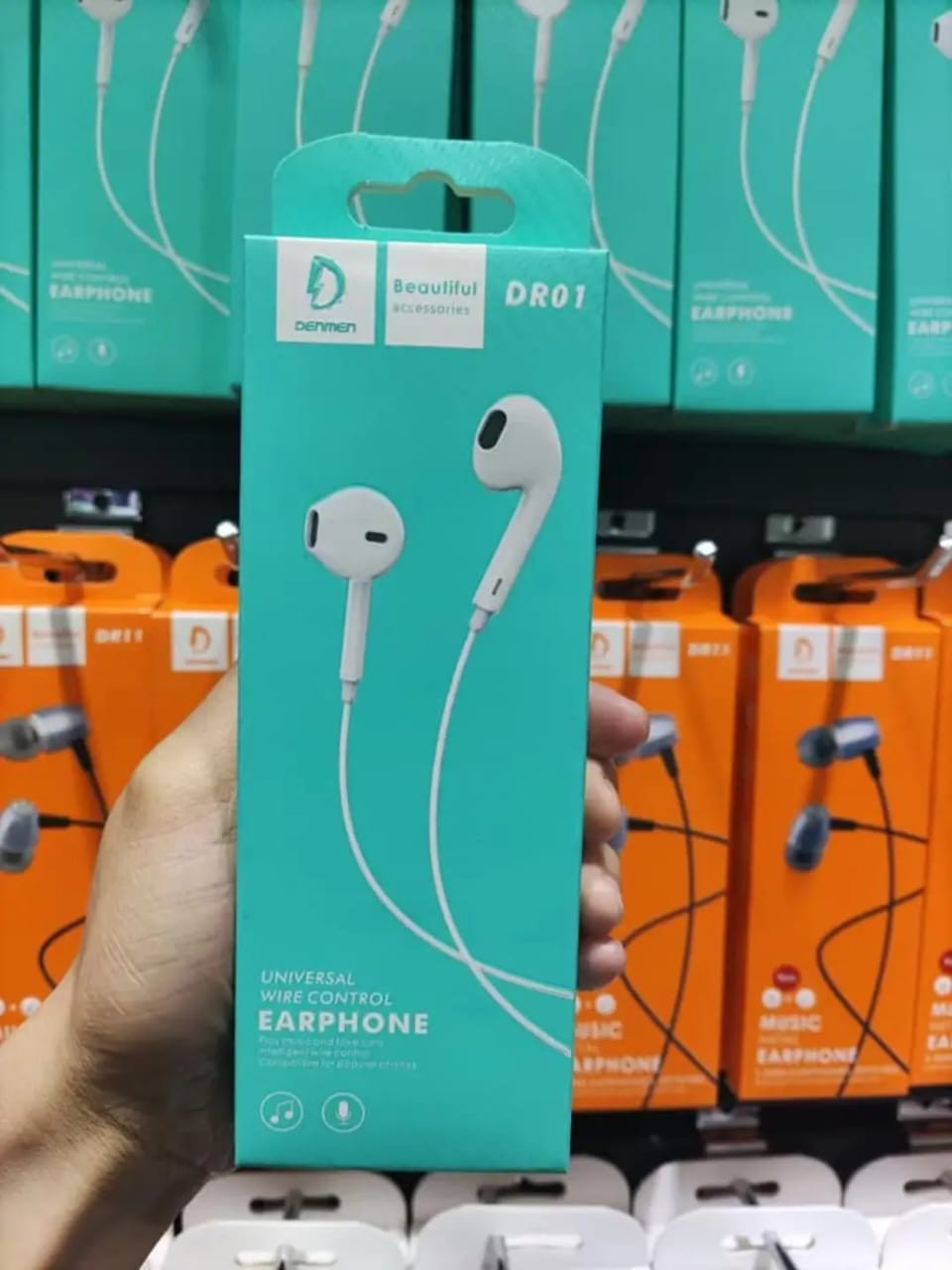 ຫູຟັງ Earphone ຍີ່ຫໍ້: DENMEN , ລຸ້ນ: DR01 . ຫູຟັງລຸ້ນນີ້ໃຊ້ງານດີສະບາຍຫູ ໃຊ້ດີທົນນານ ສຽງມ່ວນຕັດສຽງລົບກວນໄດ້ດີ.