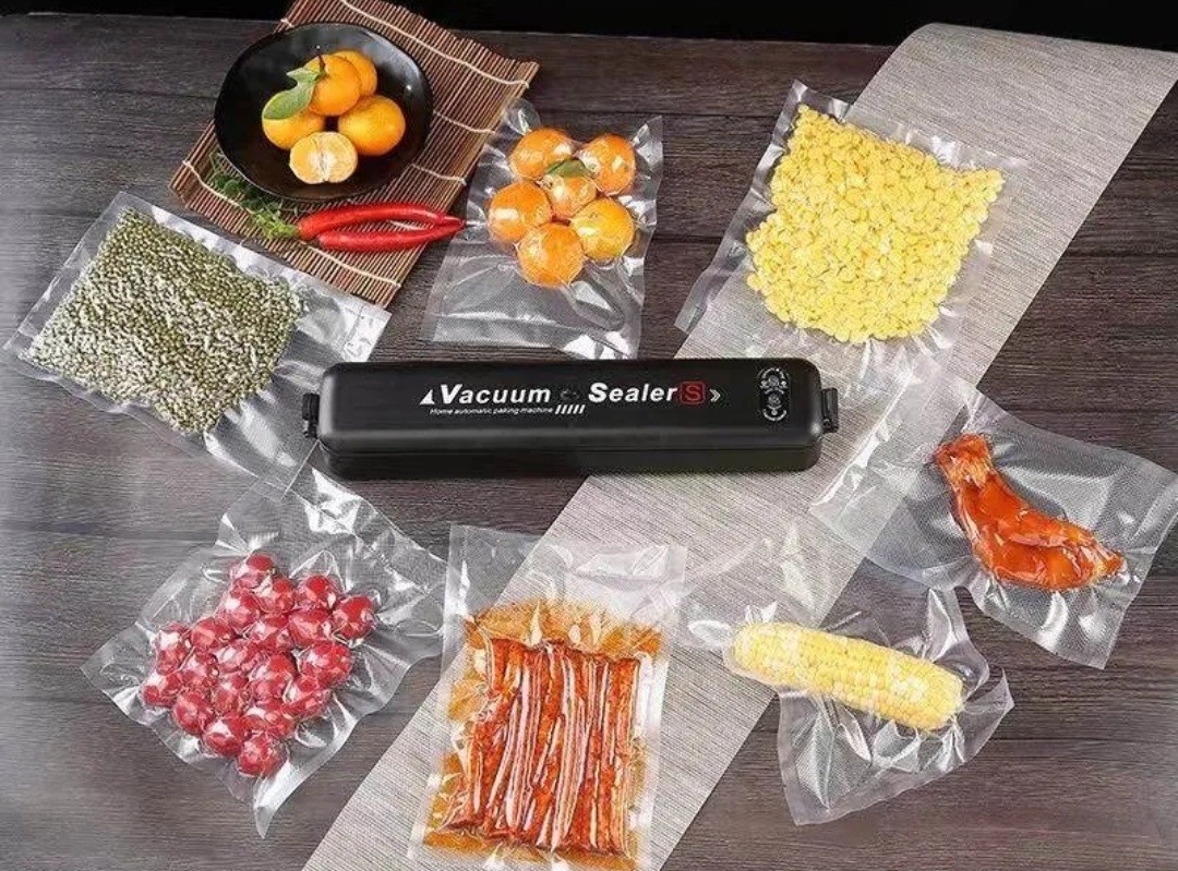 ເຄື່ອງຊິວສູນຍາກາດ Vacuum Sealer ຍີ່ຫໍ້: Ouchs Joy ລຸ້ນ: JP-12Y. ເຄື່ອງຊິວສູນຍາກາດເຮັດໃຫ້ ຮັກສາອາຫານໄວ້ໄດ້ຢ່າງມີປະສິດຕິພາບ ແລະ ດົນຂຶ້ນ.