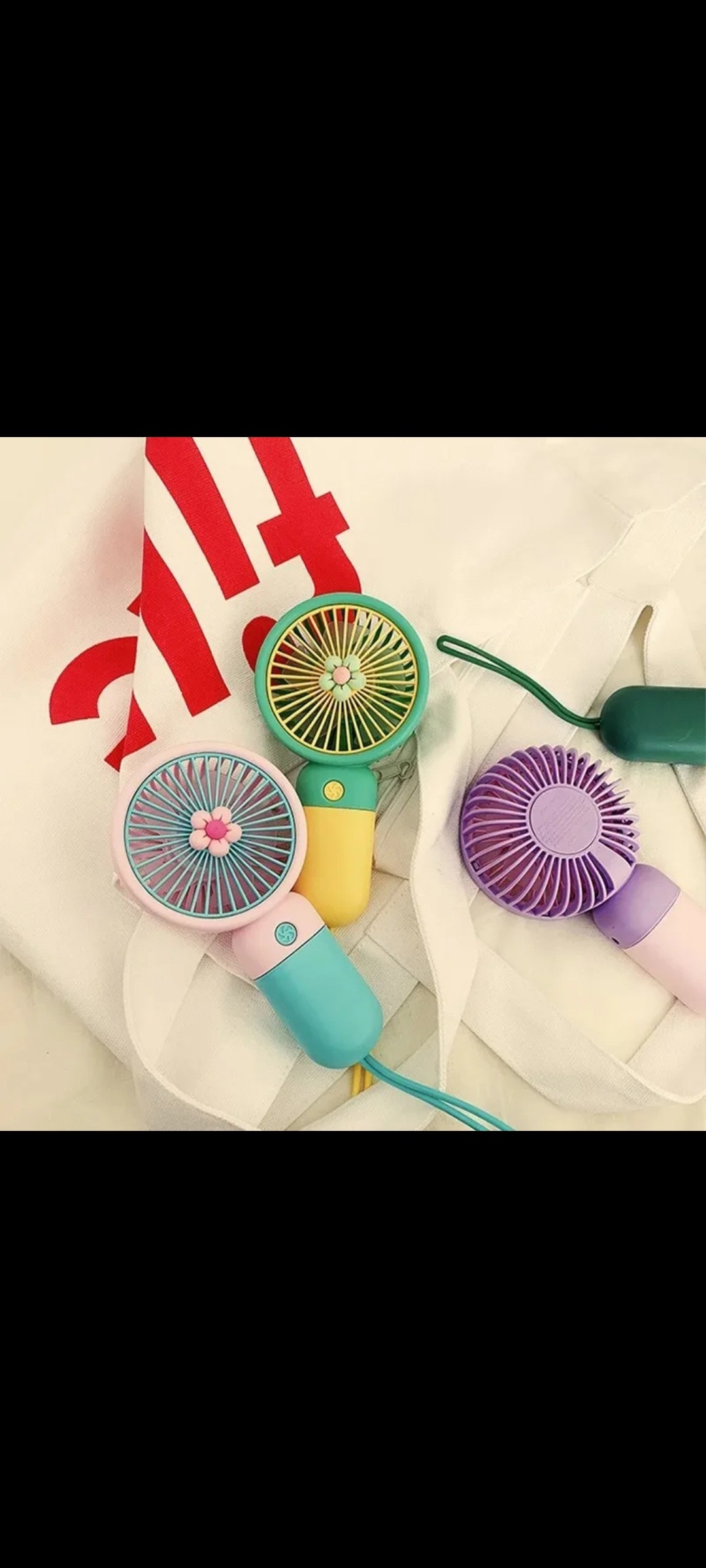 ພັດລົມນ້ອຍພົກພາ Mini Handheld Fan ມາພ້ອມສາຍສາກ ແລະ ຖານຕັ້ງ. ສາມາດປັບຄວາມແຮງໄດ້ 3ລະດັບ
